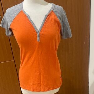Antigua Orange V-Neck Raglan Tee with Gray Sleeves
